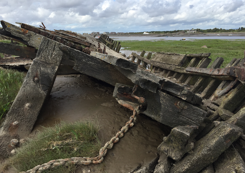 An old, decayed wooden boat